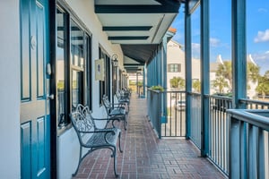 Second floor open walkway to rooms