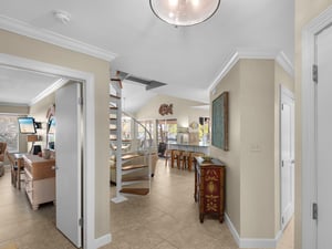 Cottage Entry with the Primary Bedroom to the left and Guest Bedroom to the Right