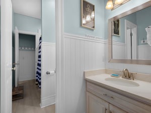 Primary Bathroom Shared between Primary and Twin Bedroom