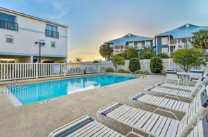 Community Pool with Lounge Chairs
