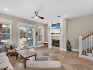 Living area with plenty of seating  decorative fireplace not operational
