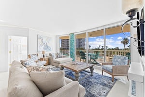 Living Room with a Beach and Pool View