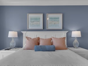 Primary bedroom with coastal vibe