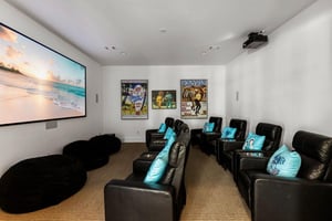 Private Theater Room on 1st Floor with Seating for 8