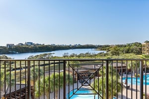 1st Floor Balcony View of Pools and Lake