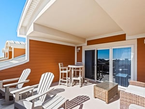 Relax on your private balcony with comfortable seating, perfect for morning coffee or evening cocktails.