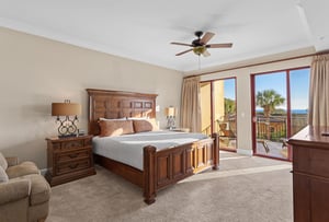 Bedroom 1 with King Bed and Private Access to Balcony