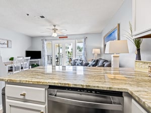 Openconcept kitchen overlooks the bright living area, perfect for cooking while staying connected with family and friends.