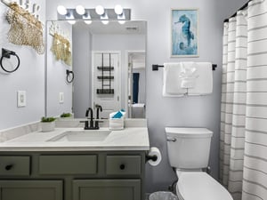 Refresh in the beautifully styled bathroom with coastal touches