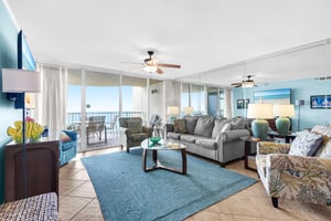 Relax in your bright living space where ocean views stretch endlessly beyond floortoceiling windows, creating the perfect backdrop for your beach getaway.