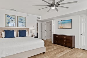 Drift off in your serene 2nd floor king master suite where coastal artwork and soft linens create the perfect retreat after beachside adventures.