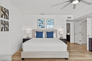 Drift off in your serene coastal 2nds floor master suite, where nautical artwork and plush bedding create the perfect seaside sanctuary.