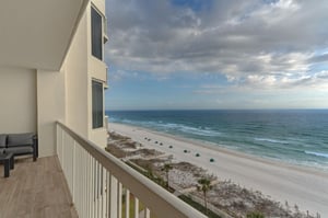 Beachfront balcony offers spectacular ocean views with direct beach access below. Modern property positioned perfectly for ultimate coastal relaxation.