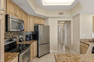 Your fullyequipped kitchen features granite countertops, stainless steel appliances, and everything you need to prepare delicious meals during your stay.
