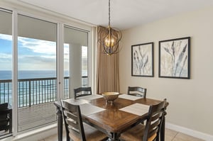 Share memorable meals in your elegant dining space, where the ocean views create the perfect backdrop for every gathering.
