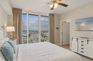 Bedroom 2 Wake up to stunning views from your comfortable bed, where coastal breezes flow through your private sanctuary.