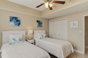 Bedroom 3 Drift off in this coastalthemed bedroom where two comfortable beds await, complete with soothing seainspired artwork and gentle ceiling fan breezes.