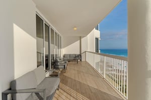 Step onto your private oceanfront balcony where comfortable seating awaits and endless sea views stretch to the horizon.