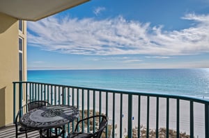 Wake up to endless turquoise waters from your private balcony.