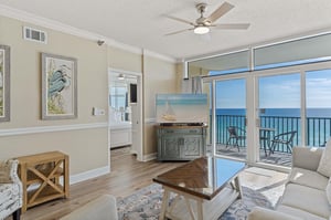 Oceanfront living room with access to your private balcony.