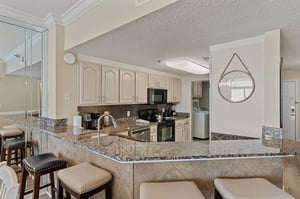 Kitchen with a breakfast bar to enjoy morning coffee and conversations.
