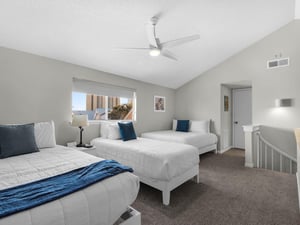 Loft Bedroom with Two Full beds, and One Twin Bed
