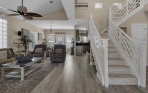 Settle into your spacious openconcept retreat with soaring ceilings, coastal charm, and abundant natural light flowing through your beach house haven.