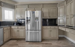 Your fully equipped kitchen awaits with stainless steel appliances, elegant cabinetry, and granite countertops perfect for preparing memorable meals during your stay.