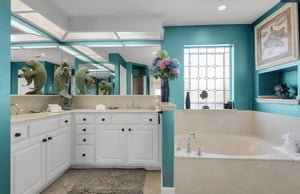 Bathroom 1 Unwind in your luxurious primary bathroom featuring granite countertops, deep soaking tub, and elegant finishes for ultimate relaxation.