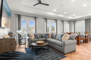 Enjoy the spacious living room featuring natural light from multiple windows and openconcept design perfect for relaxing.