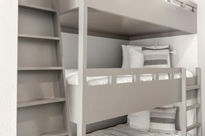 Your stylish bunk beds offer cozy comfort with crisp linens for a restful nights sleep.