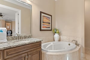Soak away your worries in your private jetted tub, surrounded by elegant granite finishes and warm touches.