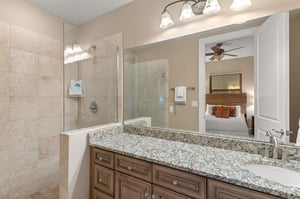 Unwind in your spalike bathroom with gleaming granite counters, glassenclosed shower, and soaking tub—your private retreat awaits.
