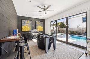 Challenge friends to foosball while enjoying the pool view