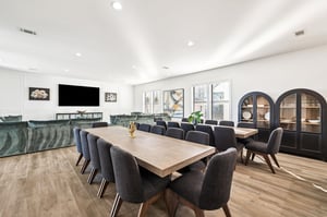 The dining room features elegant seating for gatherings for the entire family