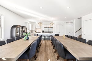 Gather around these stunning dining table where your group can share memorable meals together, with the gourmet kitchen just steps away for easy entertaining.