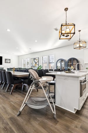Cook meals in the spacious kitchen while little ones sit safely nearby, then gather at the dining table for memorable family moments together.
