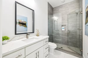 Step into your spalike bathroom with marble counters, glass shower, and elegant finishes for your perfect morning routine.