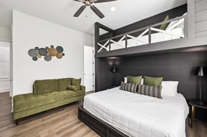 Unwind in your stylish bedroom with plush bedding, cozy seating, and thoughtful details that make every night feel like a retreat.