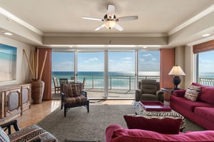 Unwind in your oceanfront living room where floortoceiling windows frame endless sea views and gentle breezes flow through your private balcony.