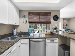 The Window Passageway in the Kitchen allows for the perfect blend of indoor  outdoor entertainment