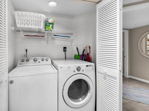 Your dedicated laundry closet keeps your vacation wardrobe fresh with fullsize washer and dryer, plus organized storage for supplies.