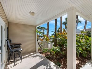 Relax on the private covered patio with comfortable seating for morning coffee or evening unwind.