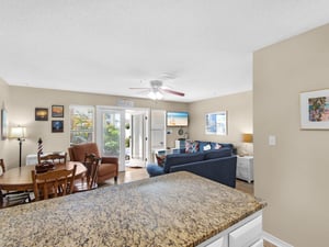 Openconcept living space where kitchen, dining, and lounge areas flow seamlessly together for memorable vacation moments.