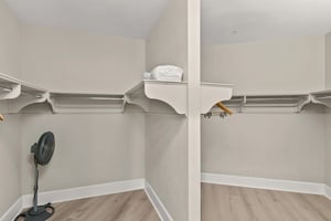 Your spacious walkin closet offers abundant hanging space and thoughtful organization for all your vacation wardrobe needs.