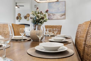 Coastalthemed dining area with plenty of space for family gatherings.