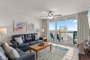 Unwind in the coastal living room with comfortable seating and stunning Gulf views