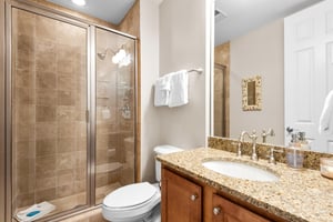 Refresh in your ensuite bathroom with granite counters, glass shower, and fluffy towels waiting for you.