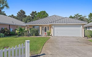 Charming singlestory home with convenient parking in a peaceful gated neighborhood.