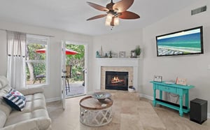 Unwind in your cozy living room with coastal vibes throughout.